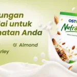 Kemasan Ostofit Nutrimeal beserta bahan utamanya: kurma, almond, oat, dan barley